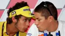 Pada tahun 2006, terjadi persaingan antara pebalap Camel Yamaha, Valentino Rossi, dengan pebalap Repsol Honda, Nicky Hayden. (EPA/Ahmad Yusni)