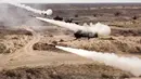 Peluncuran roket dari sistem rudal di pangkalan militer Ashuluk, Rusia, 22 September 2020. Belarusia, Armenia, China, Pakistan, dan Myanmar akan ambil bagian dalam latihan tersebut. (Russian Defense Ministry Press Service via AP)