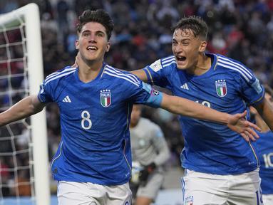 Timnas Brasil U-20 mengawali ajang Piala Dunia U-20 dengan hasil minor setelah dipecundangi Italia 2-3 pada laga pembuka Grup D yang berlangsung di Malvinas Argentinas Stadium, Mendoza, Argentina, Minggu (21/5/2023). Ketiga gol Timnas Italia U-20 seluruhnya dicetak pada babak pertama, masing-masing oleh Matteo Prati (11') dan dua gol dari Cesare Casadei (28' dan 35'). Sementara dua gol balasan Brasil dicetak malalui brace Marcos Leonardo (72' dan 87'). (AP Photo/Natacha Pisarenko)