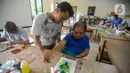 Karya seni lukis ini merupakan upaya membangun impian dan harapan para penyandang disabilitas. (merdeka.com/Arie Basuki)