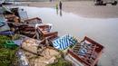 Sejumlah kerusakan akibat badai terlihat di pantai di resor liburan Travemuende, Jerman Utara, Sabtu, 21 Oktober 2023. (AP Photo/Michael Probst)