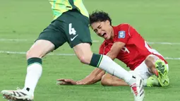 Hingga babak pertama usai, Timnas Indonesia tertinggal 0-3 dari tuan rumah Australia. (DAVID GRAY/AFP)