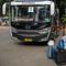 Seorang warga dengan barang bawaannya menunggu untuk menaiki bus mudik bareng gratis BUMN di kawasan Jakarta, Rabu (27/4/2022). Program mudik gratis merupakan salah satu solusi untuk mengantisipasi potensi kepadatan lalu lintas pada masa Lebaran.(Liputan6.com/Faizal Fanani)