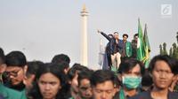 Mahasiswa gabungan se-Jabodetabek saat menggelar aksi unjuk rasa di depan Istana Merdeka, Jakarta, Selasa (16/7/2019). Dalam aksinya mereka mengecam pemerintah Jokowi atas hutang negara yang melonjak, politik dagang sapi, diskon pajak 300 persen, dan krisis penegakan HAM. (merdeka.com/Iqbal S. Nugro