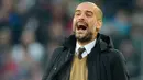 10. Josep Guardiola memutuskan tidak melanjutkan kontraknya bersama Bayern Munchen yang habis pada akhir musim lalu. Pep melanjutkan petualangannya dengan melatih Manchester City. (AFP/Nigel Treblin)