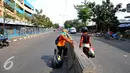 Arus lalu lintas terlihat lancar di jalan utama Pasar Minggu, Jakarta Selatan saat memasuki H+5 Lebaran masih terlihat lenggang, Jakarta, Rabu (22/7/2015). (Liputan6.com/Yoppy Renato)