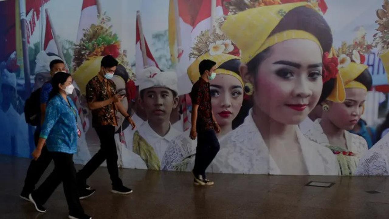 Banner Infografis Bali Siap Sambut Kedatangan Kembali Wisatawan Mancanegara. (Foto: AFP/Sony Tumbelaka)