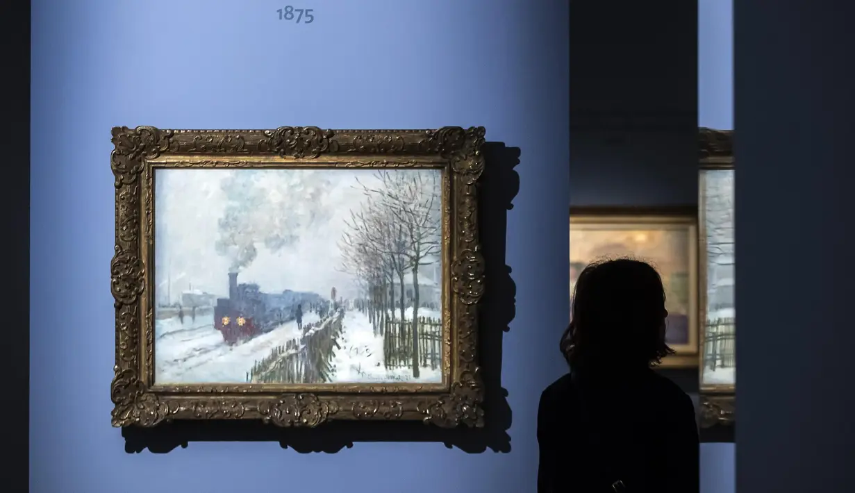 Lukisan karya Claude Monet yang berjudul 'Train in the Snow or The Locomotive' ditampilkan dalam pameran 'Monet. Capolavori dal Musee Marmottan' di Roma, Italia (18/10). (Angelo Carconi / ANSA via AP)