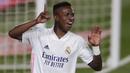 Penyerang Real Madrid, Vinicius Junior, merayakan gol yang dicetaknya ke gawang Real Valladolid pada laga lanjutan Liga Spanyol di Estadio Alfredo Di Stefano, Kamis (1/10/2020) dini hari WIB. Real Madrid menang 1-0 atas Valladolid. (AP Photo/Manu Fernandez)