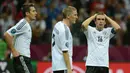 Jerman berhasil lolos ke putaran final Piala Eropa 2012 dengan hasil sempurna, 10 kali menang dalam 10 laga. Menang 3 kali dalam fase grup di putaran final, Joachim Loew membawa Jerman hingga babak semifinal. Jerman tersingkir setelah dikalahkan Italia 1-2. (AFP/Patrik Stollarz)