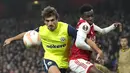 <p>Kemenangan tersebut membuat The Gunners sukses mengunci status juara grup dan melaju ke babak 16 besar tanpa melewati jalur play-off. Mereka berhasil meraih 15 poin atau unggul dua angka dari PSV Eindhoven.&nbsp;(AP/Frank Augstein)</p>