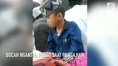 Video kocak menampilkan bocah laki-laki yang mengantuk berat di sebuah pengajian.