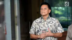 Dirut PT Mugi Rekso Abadi, Soetikno Soedarjo bersiap meninggalkan gedung KPK usai diperiksa, Jakarta, Selasa (23/2). Soetikno diperiksa sebagai saksi dugaan korupsi pengadaan mesin dan pesawat di PT Garuda Indonesia. (Liputan6.com/Helmi Fithriansyah)
