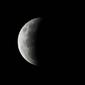 Perkembangan gerhana dimulai dengan sebagian menutupi bulan seperti yang terlihat di Sydney, Australia, pada Rabu 26 Mei 2021. (Saeed / AFP / Getty)