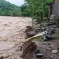 Banjir bandang ancam rumah warga, Desa Bhera, Kecamatan Mego, Kabupaten Sikka, NTT. (Liputan6.com/ Dionisius Wilibardus)