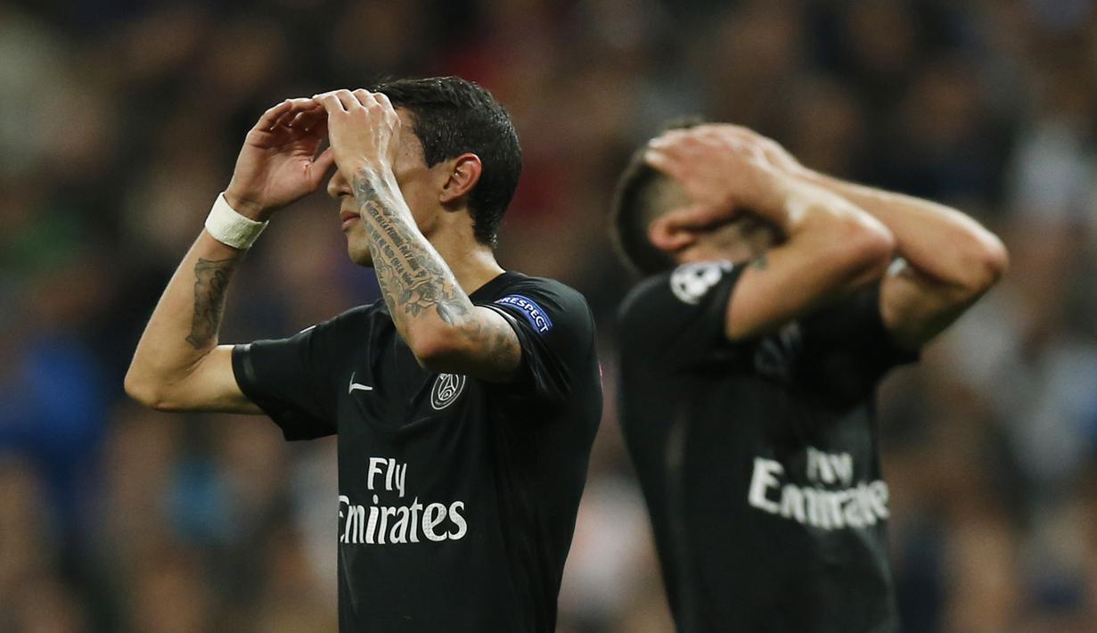 Ekspresi pemain PSG Angel Di Maria dan Thiago Motta  pada lanjutan Liga Champions Grup A di Stadion Santiago Bernabeu, Madrid, Rabu(4/11/2015) dini hari. Madrid menang tipis 1-0.  (Reuters / Sergio Perez)