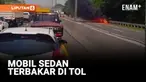 MOBIL SEDAN LUDES TERBAKAR DI TOL SIDOARJO