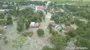 Pandangan umum menunjukkan dampak banjir bandang yang menerjang Distrik Sentani, Kabupaten Jayapura, Papua, Minggu (17/3). Berdasarkan data BNPB, banjir bandang pada Sabtu (16/3) itu mengakibatkan 58 orang meninggal. (Edward Hehareuw/via REUTERS)