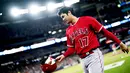 Dunia olahraga baru saja dibuat heboh setelah Shohei Ohtani menandatangani kontrak dengan Los Angeles Dodgers selama 10 tahun dengan nilai menacapai 700 juta dolar Amerika Serikat atau sekitar 10,8 triliun rupiah. (Getty Images/AFP/Mark Blinch)