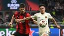 Gol Gianluca Mancini menjadi satu-satunya yang tercipta pada laga leg pertama perempat final Liga Europa 2023/2024 antara AS Roma melawan AC Milan. (Isabella BONOTTO/AFP)