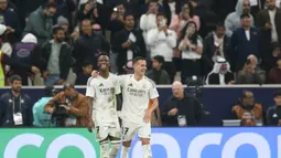 Pertandingan di Stadion Lusail di Qatar berlangsung berat sebelah. Real Madrid bermain dominan dan hanya sesekali membiarkan lawan mereka mengancam lewat serangan balik. (AP Photo/Hussein Sayed)