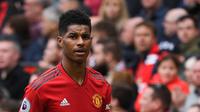 5. Marcus Rashford (Manchester United) - Kepiawaian mengolah si kulit bundar dan mampu berduel di udara membuat pemain muda asal Inggris ini menjadi penyerang andalan Setan Merah besutan pelatih Ole Gunnar Solskjaer. OVR 83 - 88. (AFP/Paul Ellis)