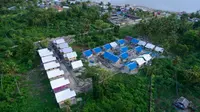 Hunian di kawasan relokasi mandiri warga Mamboro hasil kolaborasi Arkom Indonesia dan penyintas bencana yang meraih World Habitat Awards Bronze Winner 2021 oleh World Habitat bekerjasama dengan UN-Habitat. (Foto: Arkom Indonesia).