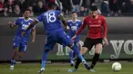 Penyerang Rennes Martin Terrier berebut bola dengan bek Leicester City Daniel Amartey pada leg kedua babak 16 besar Europa Conference League di Roazhon Park , Jumat (18/3/2022) dini hari WIB. Meski kalah dengan skor tipis 1-2, Leicester City tetap lolos ke perempat final. (AP Photo/Jeremias Gonzalez