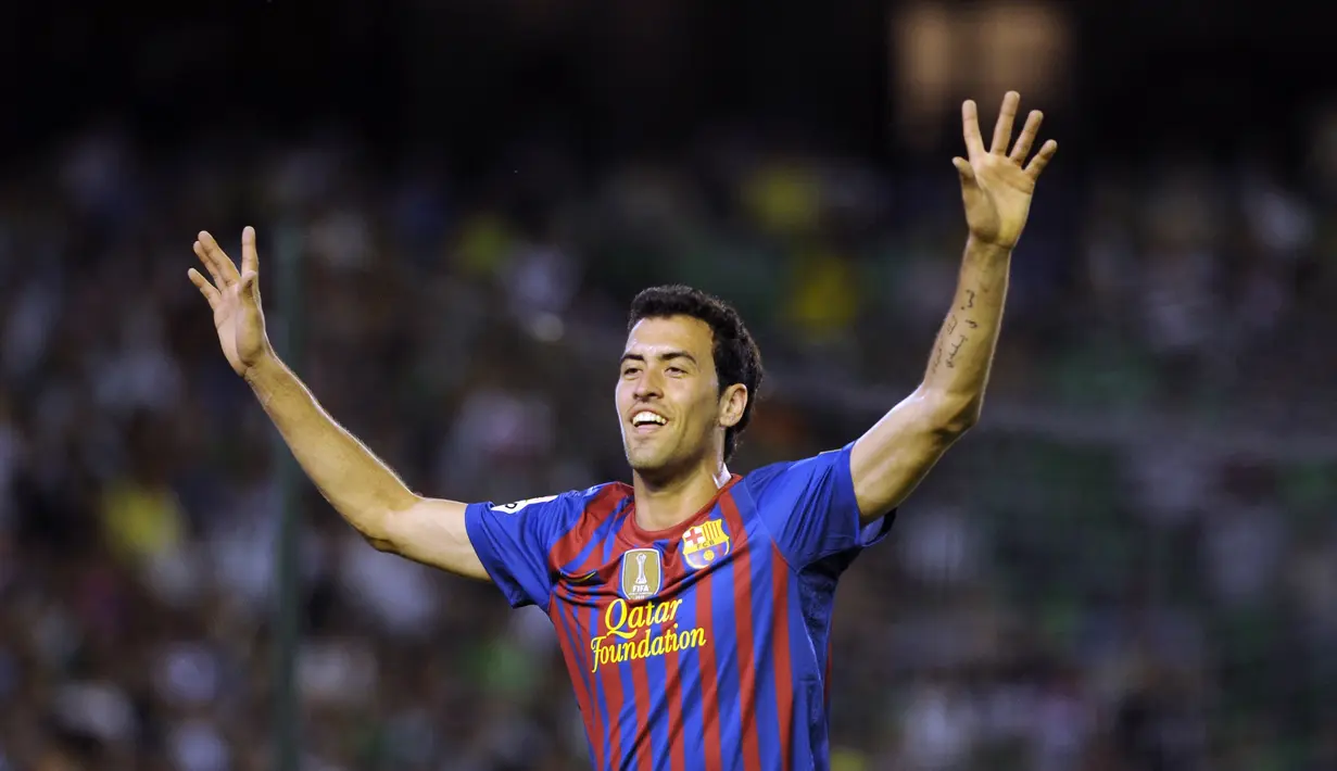 3. Sergio Busquet - Gelandang bertahan 32 tahun ini juga pernah meraih dua kali treble winners bersama Barcelona. Sergio Busquet menjadi pemain inti saat Barcelona meraih treble winner pada 2009 dan 2015. (AFP/Cristina Quicler)