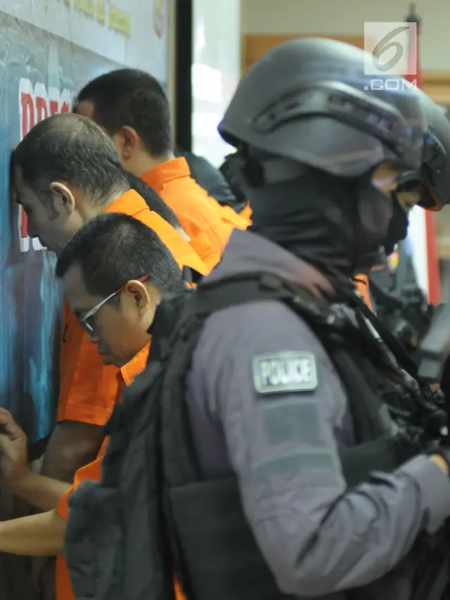 Polisi Tahan Delapan Tersangka Kasus Perdagangan Orang