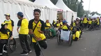 Herianto Wahmiko merupakan atlet difabel asal Aceh yang meriahkan Bhayangkara Run 2017 di Lapangan Monas, Jakarta, Minggu (16/7/2017) (Bola.com/Zulfirdaus Harahap)