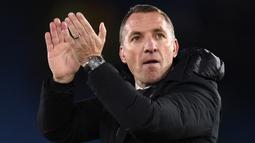 Brendan Rodgers. Pelatih asal Irlandia Utara berusia 49 tahun yang sejak tengah musim 2018/2019 menukangi Leicester City  ini menempati posisi kelima sebagai pelatih dengan nilai transfer termahal sepanjang sejarah. Ia didatangkan The Foxes dari Glasgow Celtic dengan biaya 10,4 juta euro atau kini setara Rp156 miliar dan terikat kontrak hingga Juni 2025. Bersama Leicester City ia telah mengoleksi 2 trofi juara, yaitu Piala FA 2020/2021 dan Community Shield 2021. (AFP/Oli Scarff)