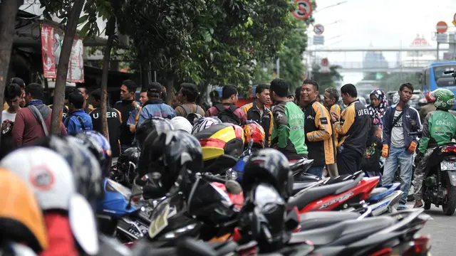 Uber Diakuisisi Grab, Mantan Driver Pindah Massal ke Go-Jek