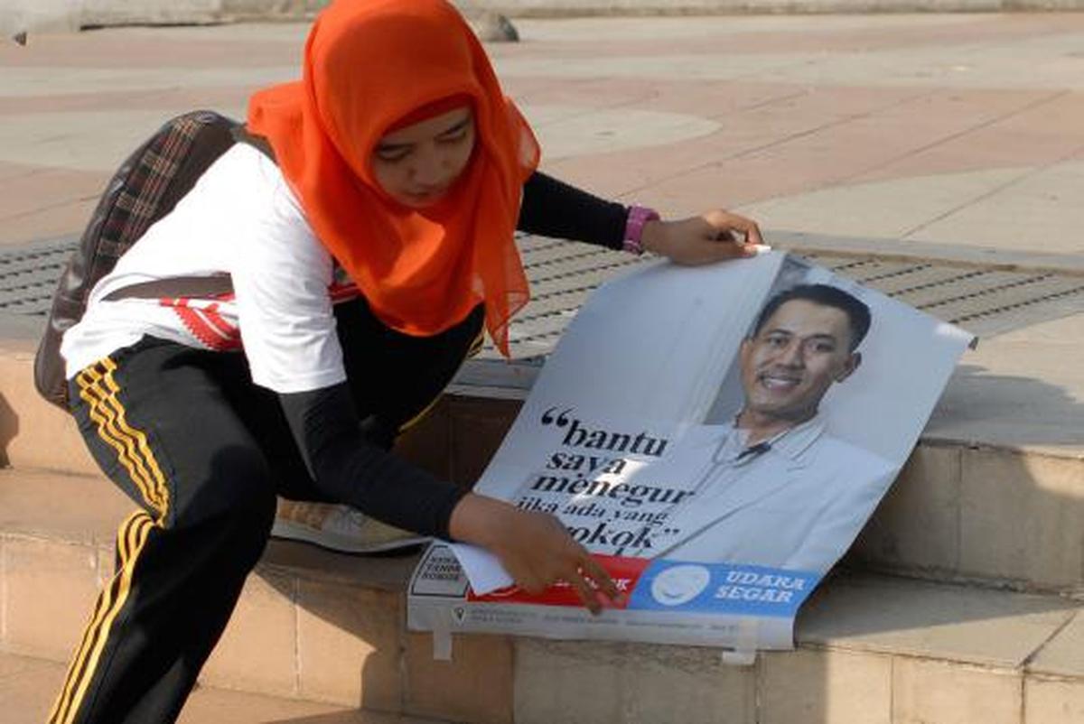 Aksi kampanye anti asap rokok di HI