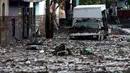 Sejumlah mobil terendam di jalan berlumpur setelah aliran El Seco meluap akibat hujan lebat di Zapopan, Jalisco State, Meksiko, Senin (26/7/2021). (AFP/Ulises Ruiz)