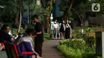 Warga bermain di Taman Situ Lembang, Menteng, Jakarta, Rabu (26/7/2023). (Liputan6.com/Angga Yuniar)