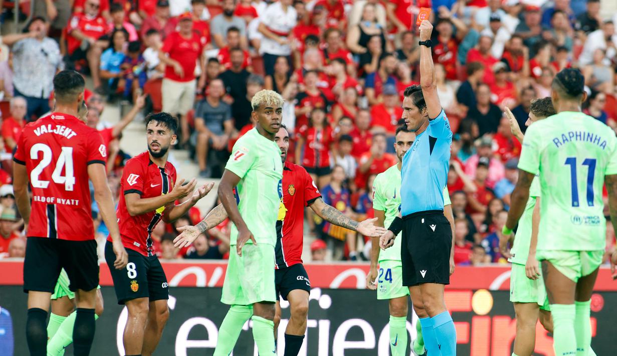 Situasi makin mudah bagi Barcelona setelah Mallorca dipaksa bertarung dengan sembilan pemain sejak babak pertama akibat dua kartu merah. (AFP/Jaime Reina)