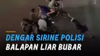 Belum mulai balap liar. Sekumpulan pemuda kabur ketika mendengar suara sirine polisi.