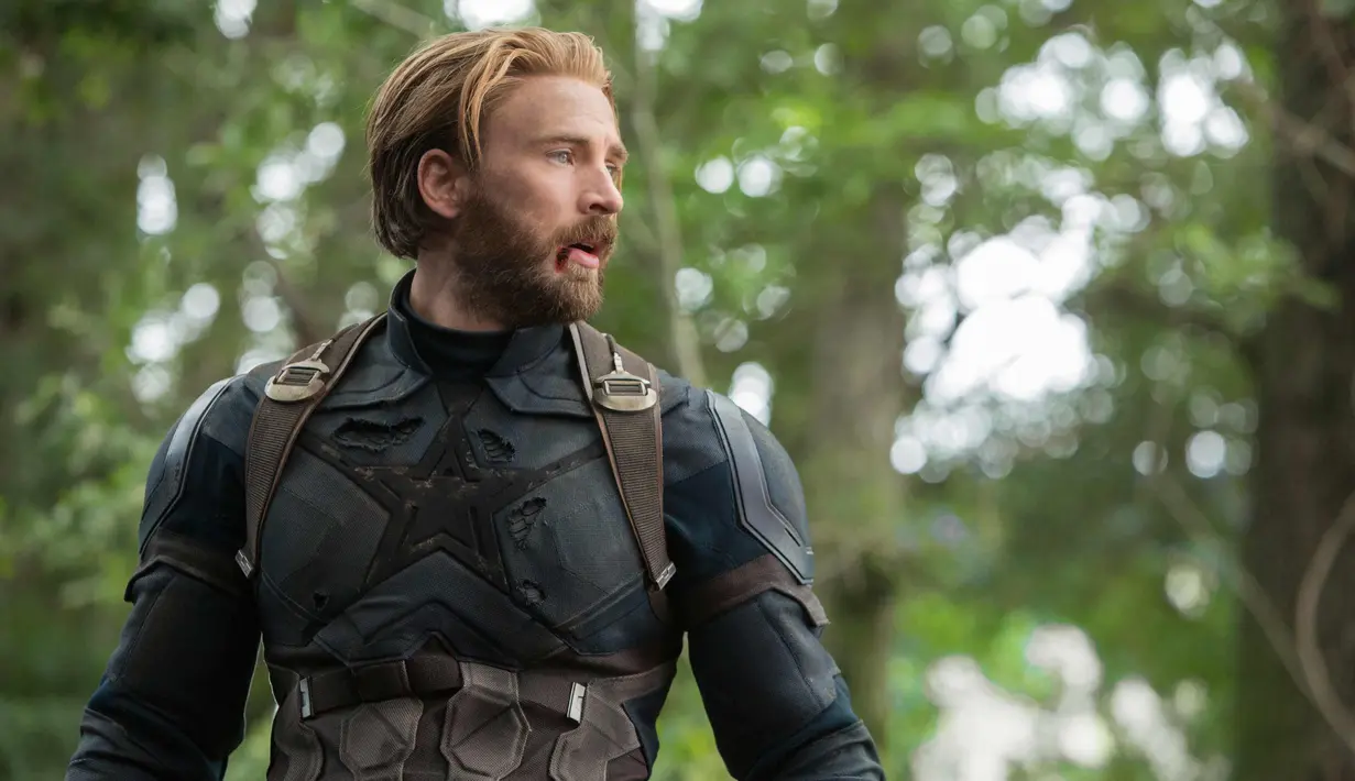 Aktor Chris Evans saat beradegan dalam film Avengers Infinity War. Chris Evans berperan sebagai Steve Rogers/Captain America di film tersebut. (Chuck Zlotnick/Marvel Studios via AP)