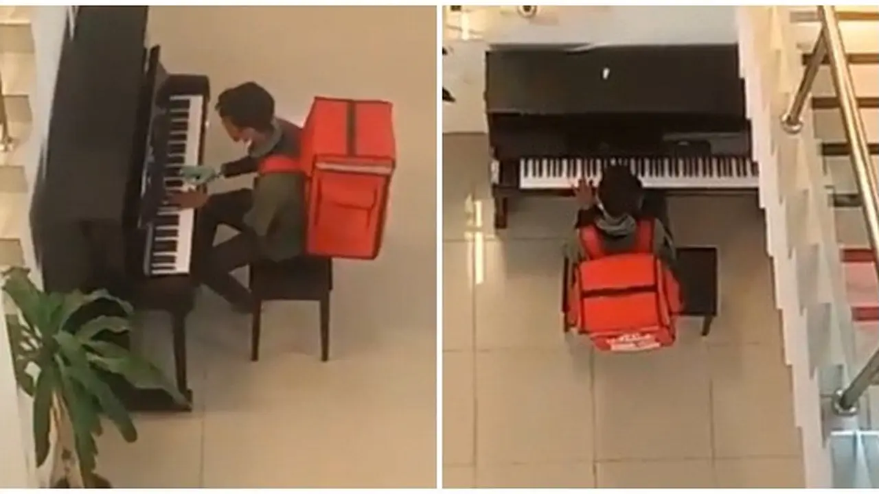 Viral, Aksi Driver Ojol Bermain Piano saat Tunggu Konsumen Ini Curi Perhatian