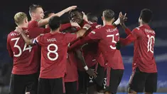 Pemain Manchester United merayakan gol yang dicetak Paul Pogba ke gawang Brighton pada laga Carabao Cup di Stadion Falmer, Kamis (1/10/2020) dini hari WIB. Manchester United menang 3-0 atas Brighton.  (Andy Rain/Pool via AP)