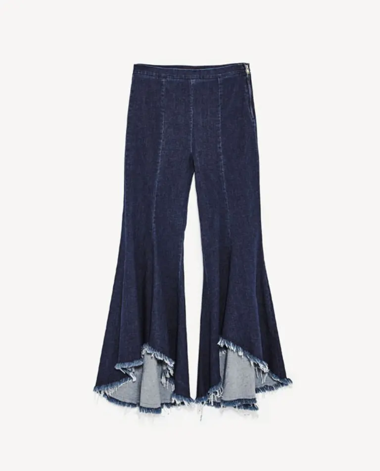 Asymmetric Flared Denim Trousers Details Rp. 399.900. (Image: zara.com)
