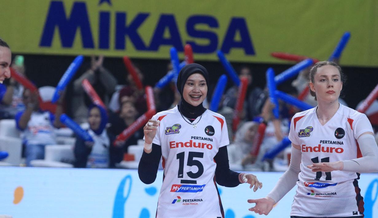<p>Selebrasi dua pemain Jakarta Pertamina Enduro, Hany Budiarti (kiri) dan Polina Shemanova setelah mencetak angka saat menghadapi Jakarta Livin Mandiri pada laga seri ketiga putaran kedua PLN Mobile Proliga 2024 di GOR Ken Arok, Malang, Minggu (16/6/2024). Jakarta Pertamina Enduro menang 3-0 (25-19, 25-20, 25-18). (Dok. PBVSI)</p>