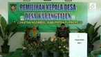 Sepasang suami istri maju dalam pemilihan kepala desa di Purworejo, Jawa Tengah.