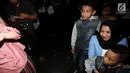 Terdakwa kasus suap pemberian izin lokasi perkebunan di Kutai Kartanegara Rita Widyasari bersiap menjalani sidang pembacaan vonis di Pengadilan Tipikor, Jakarta, Jumat (6/7). Rita dihukum 10 tahun penjara dan denda Rp 600 juta. (Liputan6.com/Johan Tallo)