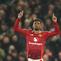 Pemain Manchester United (MU), Amad Diallo, merayakan suksesnya mencetak gol ke gawang Southampton pada lanjutan Liga Inggris 2024/2025 di Old Trafford, Jumat (17/1/2025) dini hari WIB. (AP Photo/Dave Thompson)