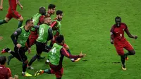 Ekspresi pemain Portugal, Eder, setelah mencetak gol kemenangan ke gawang Prancis pada laga final Piala Eropa 2016 di Stade de France, Saint-Denis, Senin (11/7/2016) dini hari WIB. (AFP/Miguel Medina)