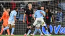 Para pemain Celta Vigo merayakan gol kedua mereka selama pertandingan sepak bola Liga Spanyol melawan FC Barcelona di stadion Balaidos, Vigo pada Sabtu 23 November 2024 waktu setempat atau Minggu 24 November 2024 dini hari Waktu Indonesia Barat. (MIGUEL RIOPA/AFP)