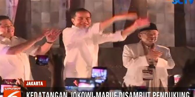 Kemeriahan Pendukung Jokowi-Ma'ruf Sambut Nomor Urut di Tugu Proklamasi