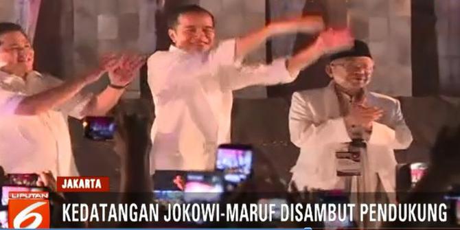 Kemeriahan Pendukung Jokowi-Ma'ruf Sambut Nomor Urut di Tugu Proklamasi